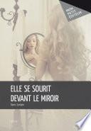 Elle se sourit devant le miroir