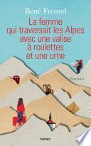 La Femme qui traversait les Alpes avec une valise à roulettes et une urne