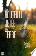Une bouteille jetée à la terre